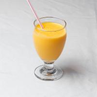 Mango Lassi · Rich creamy churned yogurt sweet drink seasoned with fresh mango.