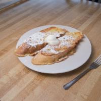 Sourdough French Toast · Thick sliced sourdough cooked light and fluffy then dusted with powered sugar. Served with w...