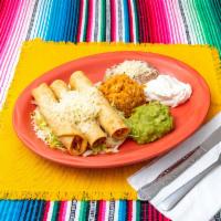 Flauta Dinner · 3 fried corn taquitos beef or chicken served with guacamole, sour cream, rice, beans and let...