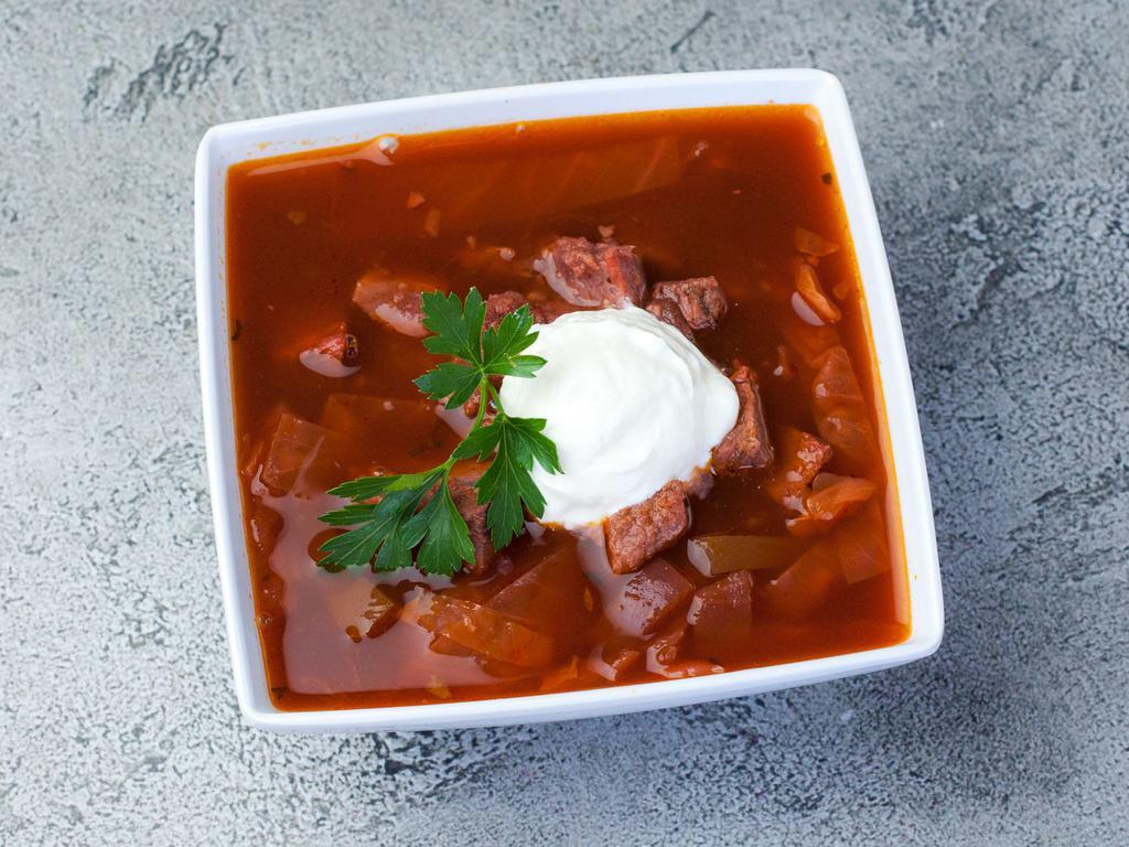Borscht with Meat · Beef, Beet, carrot, onion, potato, cabbage and optional sour cream.