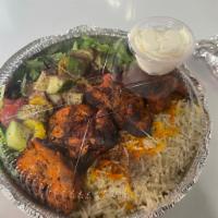 Chicken Kabob Platter · Sandwich with filling that was cooked on a skewer.