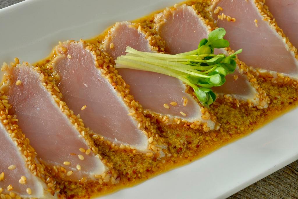 Gluten Free Haji Tataki · Sesame crusted seared albacore, served in a warm, whole grain mustard ponzu sauce.