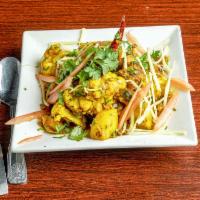 Aloo Gobi · Cauliflower and potatoes cooked with tomato, onion, herbs and spices garnished with fresh co...