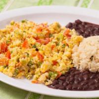 Huevos a la Mexicana Breakfast · Scrambled eggs with chopped tomato, onion, and jalapeno chile. Served with rice and black be...