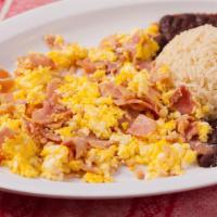 Huevos Revueltos con Jamon Breakfast · Scramble eggs with ham. Served with rice and black beans. Servido con arroz y frijoles negros.