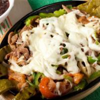 Nopal Zapoteco · Critics favorite. Grilled cactus, topped with grilled beef or chicken, onion, bell pepper, t...