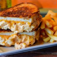 Baffalo Ranch Grilled Cheese Panini  · Grilled panini bread, grilled chicken, buffalo ranch sauce, Gorgonzola cheese,
shredded yell...