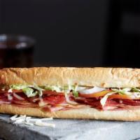 The Godfather Premium Sub · Ham, turkey, pepperoni, salami , and Wisconsin cheese blend piled high with lettuce, tomatoe...