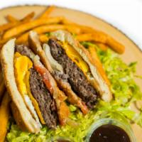 Habibi Burger Combo · 100% Halal 1/2 lb of beef top sirloin mixed with a lamb burger patty, romaine lettuce, grill...