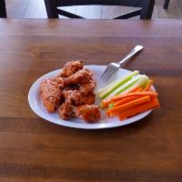 Hot Wings · Served with ranch or blue cheese, carrots and celery. Flavors: hot, extra hot, mango habaner...
