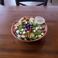 Mediterranean Salad · Romaine lettuce, sun dried tomato, green bell pepper, red onion, Greek olives, feta cheese a...