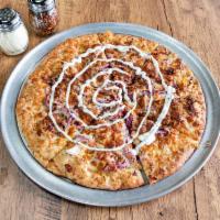 Chicken Bacon Ranch Pizza · Chicken, bacon, onions, cheddar and mozzarella cheese, topped with ranch dressing.
