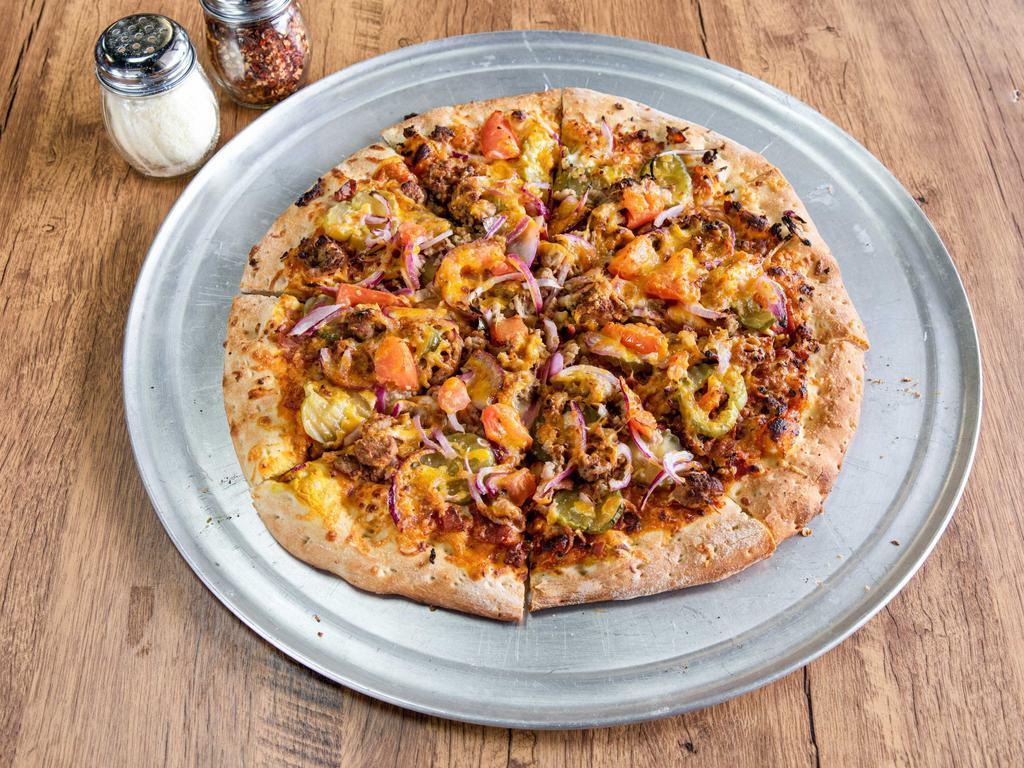 Cheeseburger Pizza · Ketchup/Mustard sauce, cheddar, bacon, pickle, ground beef, onions, tomato