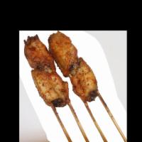 9. Chicken Wing · Cooked wing of a chicken coated in sauce or seasoning.