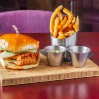 Fried Chicken Sandwich · Crispy chicken thigh, sharp cheddar, bread ＆ butter pickles, white bbq sauce, bibb lettuce, ...