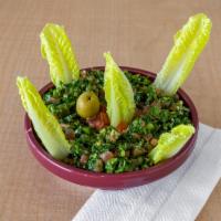 Tabbouleh Salad · Chopped parsley, diced tomatoes, green onions, crushed wheat (burghul), lemon juice, and ext...