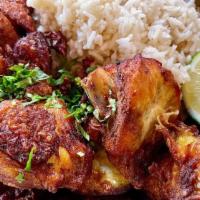 CHICHARRON DE POLLO · fried chicken, white rice, frijoles & maduros