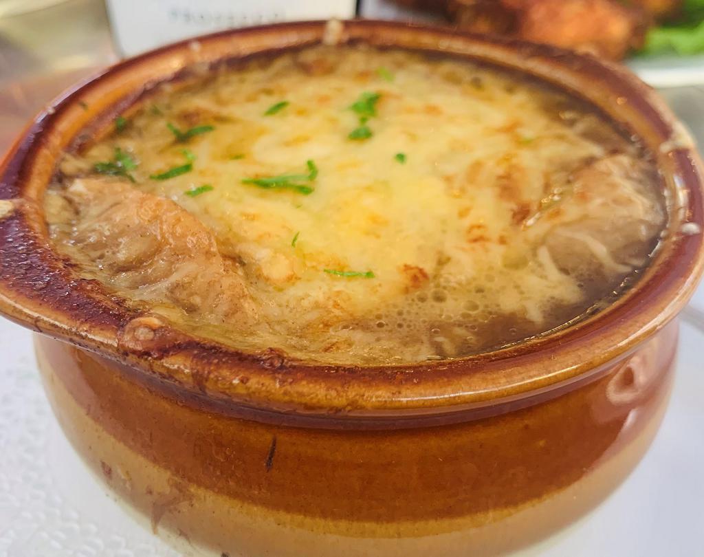 Onion Soup Gratinee · French onion soup with Croutons & melted gruyere.
