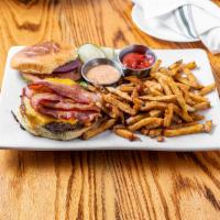 Impossible Burger · Plant-based patty, house burger sauce, lettuce, tomato, red onion - served with hand-cut chi...