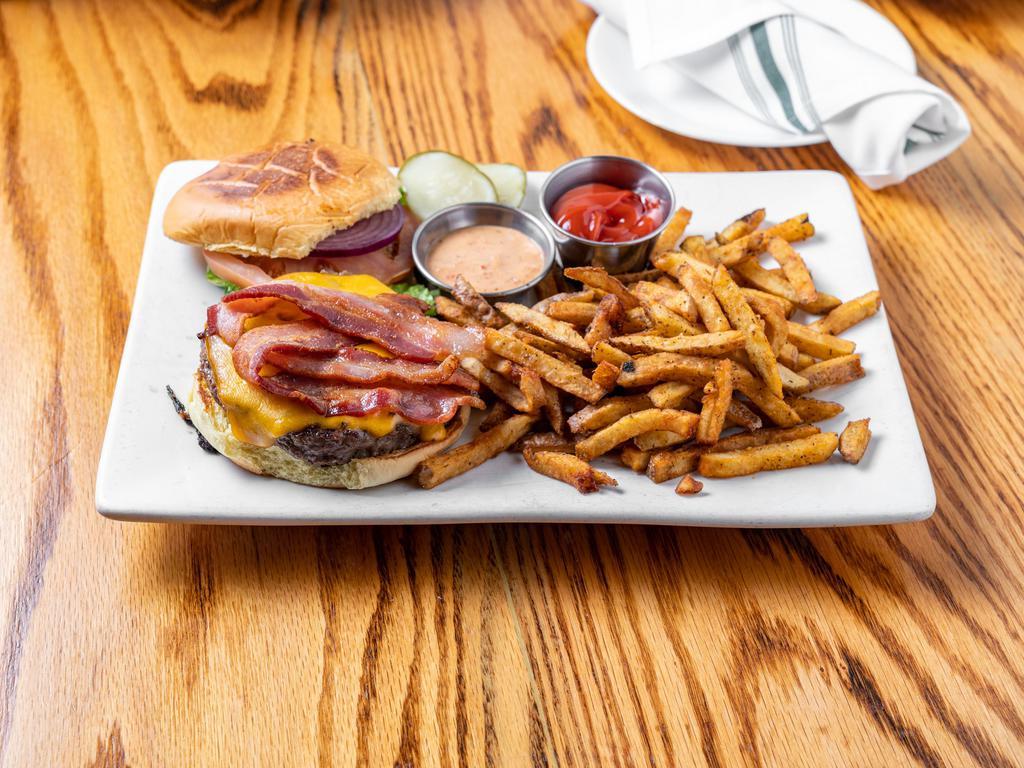Impossible Burger · Plant-based patty, house burger sauce, lettuce, tomato, red onion - served with hand-cut chili seasoned fries on a toasted martins bun.
