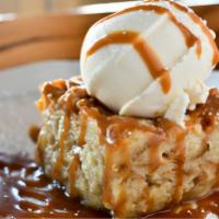 RSC Classic Bread Pudding · Bread pudding made with fresh croissants, topped with vanilla ice cream and house-made caram...
