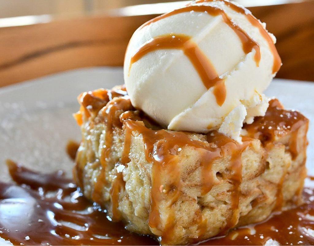 RSC Classic Bread Pudding · Bread pudding made with fresh croissants, topped with vanilla ice cream and house-made caramel sauce (ice cream on the side).
