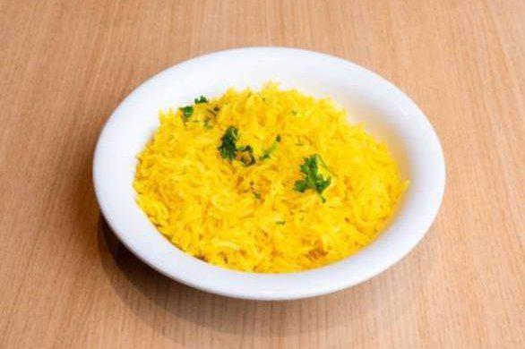 Side Rice · Basmati Rice with special seasoning and turmeric.