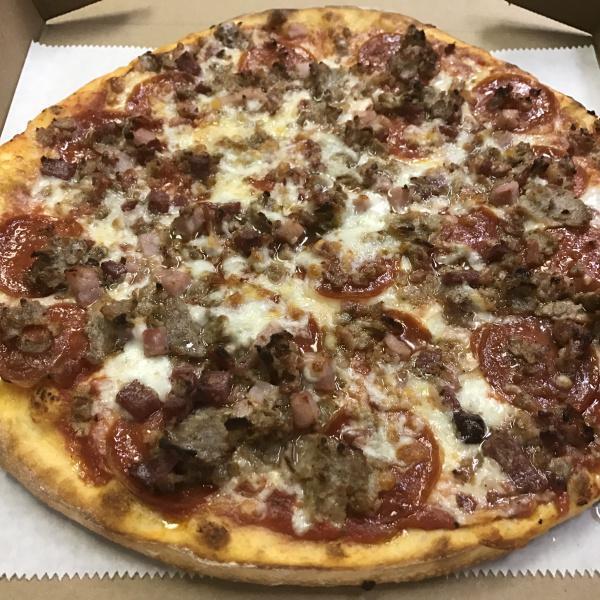 Meat Lover Pizza · Ham, salami, pepperoni, meatballs, bacon and sausage.