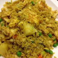 5. Curry Chicken and Shrimp Fried Rice · Stir-fried rice with shellfish and chicken, cooked in spicy curry sauce.