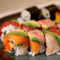 Rainbow Roll · Tobiko, avocado, and crabstick with tuna, salmon, yellowtail, white fish on top.