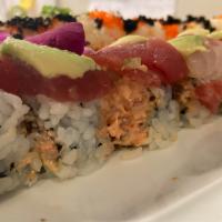 Summer Roll  · Spicy tuna and cucumber inside with tuna, salmon, white fish, yellowtail, avocado on top