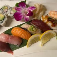 Nigiri Regular · 7 pieces nigiri and California maki. Chef’s choice of assorted slices of raw fish on sushi r...