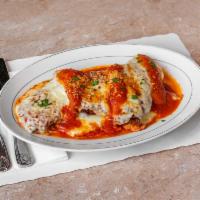 Chicken Parmigiana · Covered in tomato sauce and cheese. 