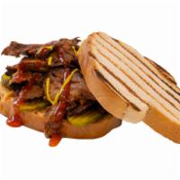 4. Yummy Beef Brisket · Our slow cooked beef brisket, served with pickle, mustard and BBQ sauce on toasted sourdough...