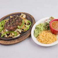 1. Fajita Plate · Beef, chicken fajita or combo. Served with rice, beans, pico de gallo and guacamole.