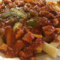 Chicken Cacciatore · Grilled chicken breast with peppers and onions served over choice of pasta. 