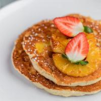 Upside Down Pineapple Pancakes · Two Buttermilk Pancakes with Pineapple cooked inside!