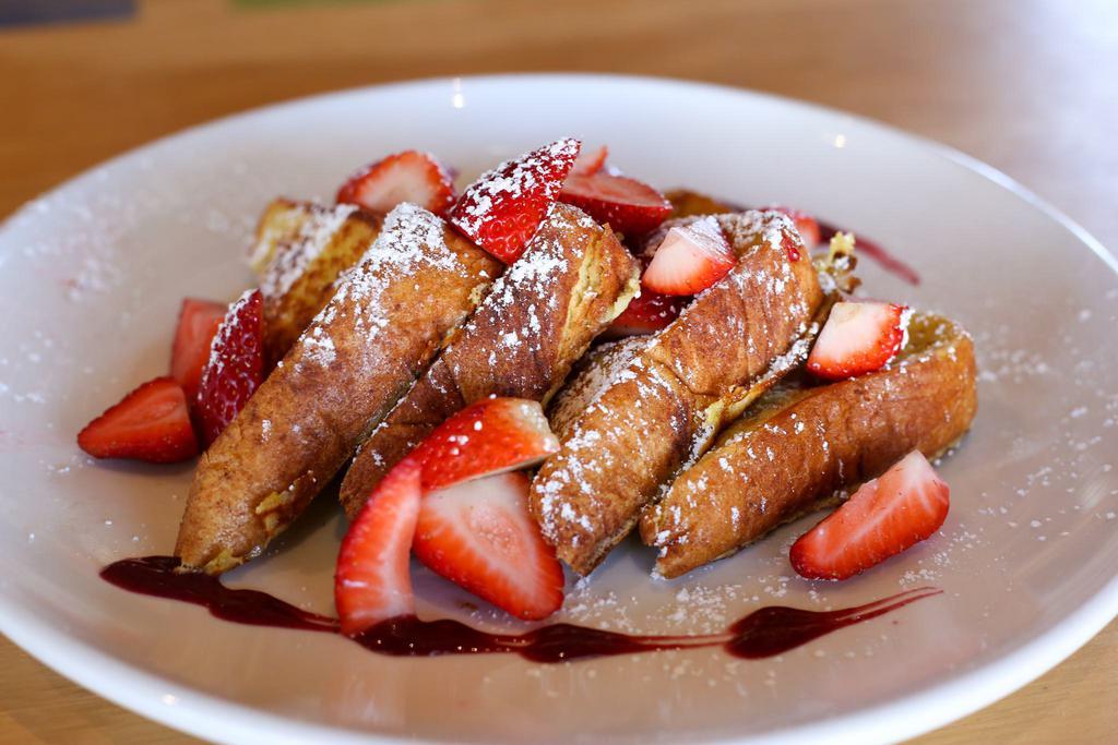 French Toast with Fresh Strawberries · Panfried bread.