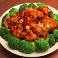 S-11. General Tso's Chicken · Chunks of boneless chicken marinated and fried until crispy in a spicy, tangy sauce and serv...