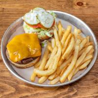 Classic Cheese Burger · Aged cheddar, shredded lettuce, diced onion, sliced tomato, haus dressing, pickles