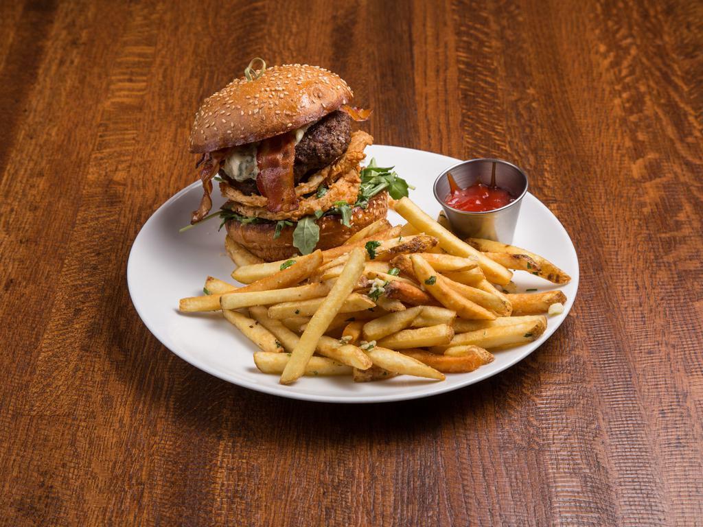 Bleu Bacon Burger · crispy bacon, bleu cheese, fried onion strings, shredded lettuce, sliced tomato, bleu cheese dressing