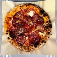 Spicy Sow Pizza · Pepperoni and spicy sopressata.