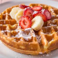 Classic Belgian Waffles · Belgian Waffle, Syrup & Whipped Butter. Dusted with Powdered Sugar.
