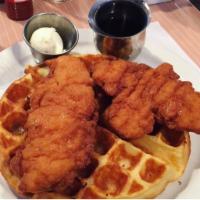 Chicken ‘n’ Waffles  · Belgian Waffle topped with Crispy Fried Chicken Breast Tenders. Served with Maple Syrup.
