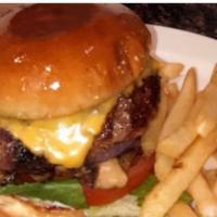 Signature Half Pound Grilled Burger · Grilled Half Pound Burger.  Served with French Fries and our Homemade Apple Cole Slaw