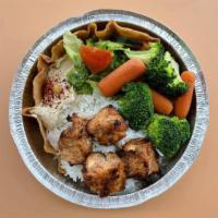 Chicken Bowl · Served with rice and steamed vegetables.