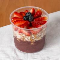 Acai Bowl* · Acai, banana, strawberry, blueberry, shredded coconut, granola and honey.