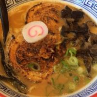 Miso Ramen · A pork, fish-dashi and vegetable broth combined with a house-blend miso. Topped with chashu,...