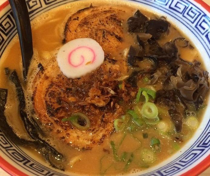 Miso Ramen · A pork, fish-dashi and vegetable broth combined with a house-blend miso. Topped with chashu, scallions, fried onions, naruto (fish cakes), menma (marinated bamboo shoots), kikurage (wild ear mushrooms) and nori (dried seaweed).


