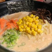Veggie Miso Ramen · Our miso paste blended with a vegetable paste and almond veggie broth. Topped with scallions...